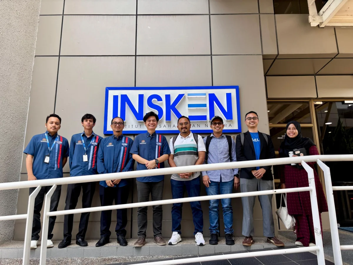 The Lonjak Ventures team with partners outside the INSKEN building.